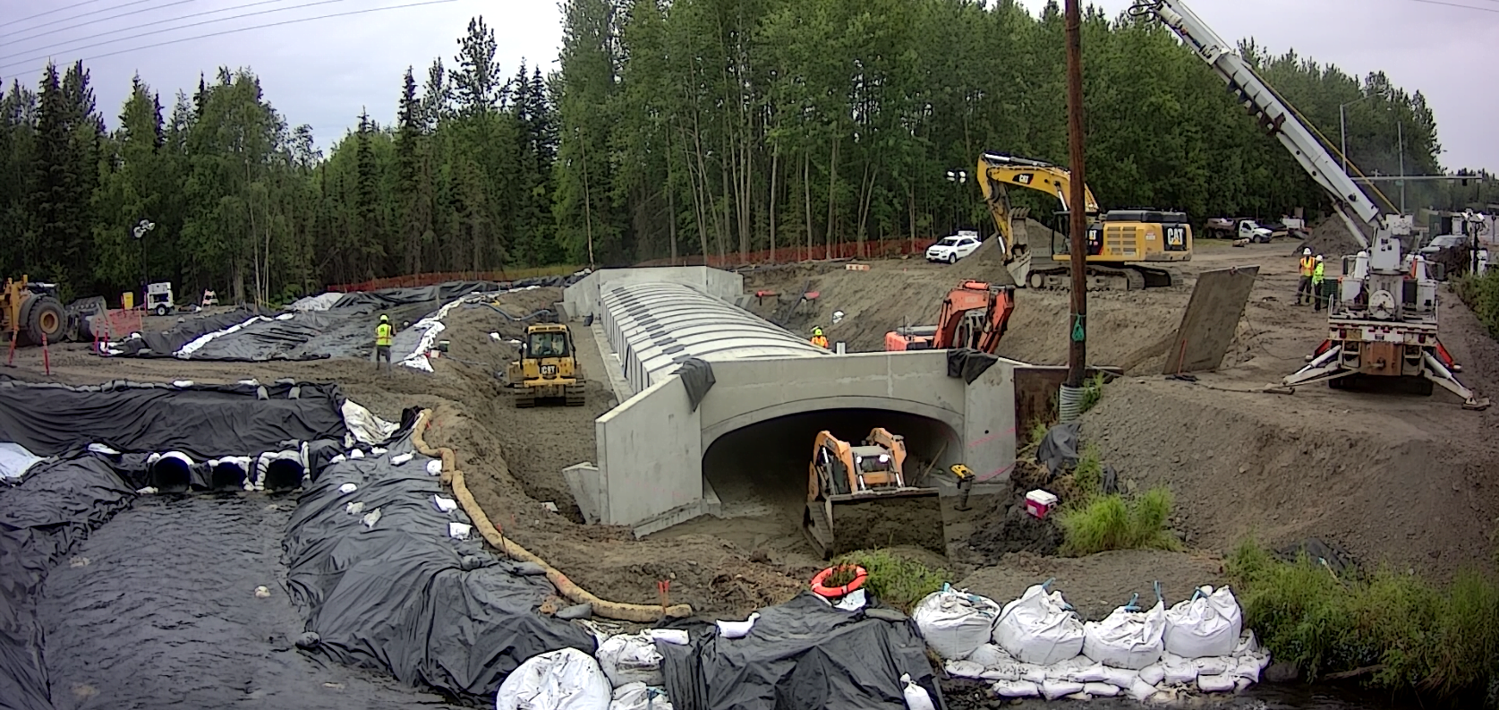 Photo of culvert backfilling and creek diversion.
