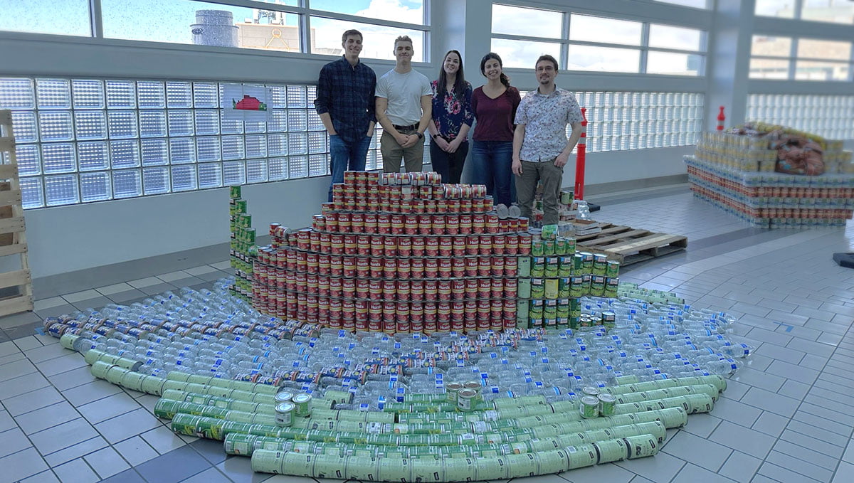 Photo of CRW Engineering employees participating in 2023 CANstruction in Anchorage, AK.