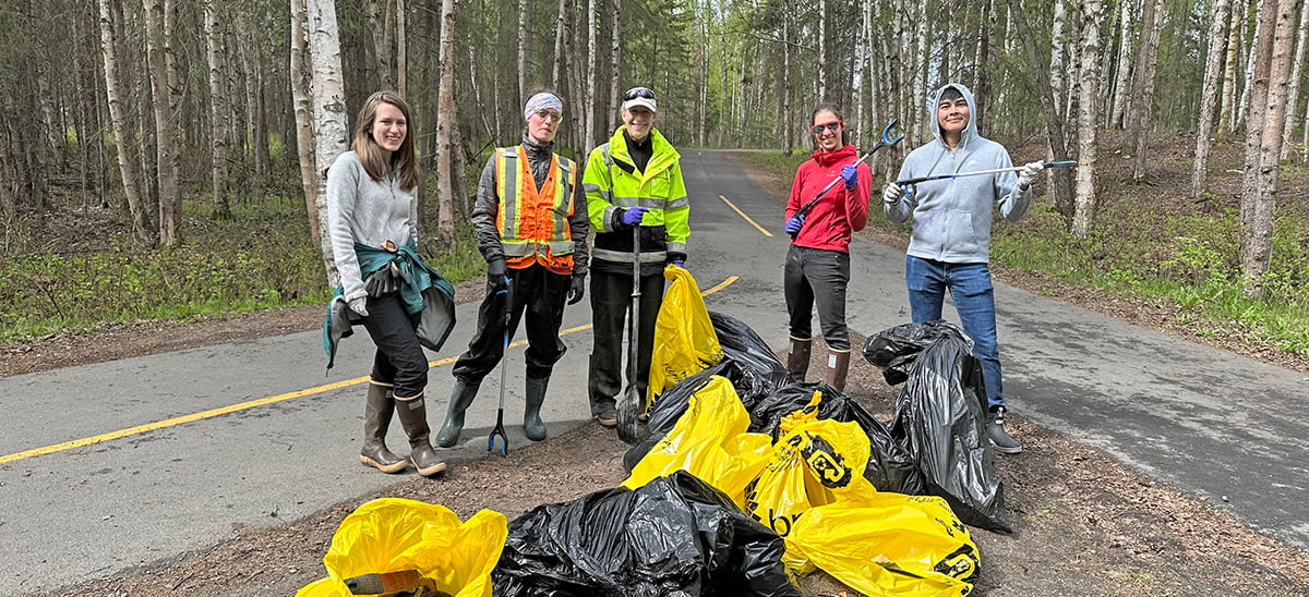 Photo of CRW Engineering Group employees participating in Chester Creek Cleanup.